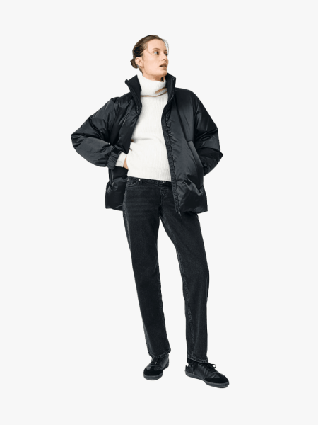 H&M Mama Straight Jeans in black washed variant on a light gray background